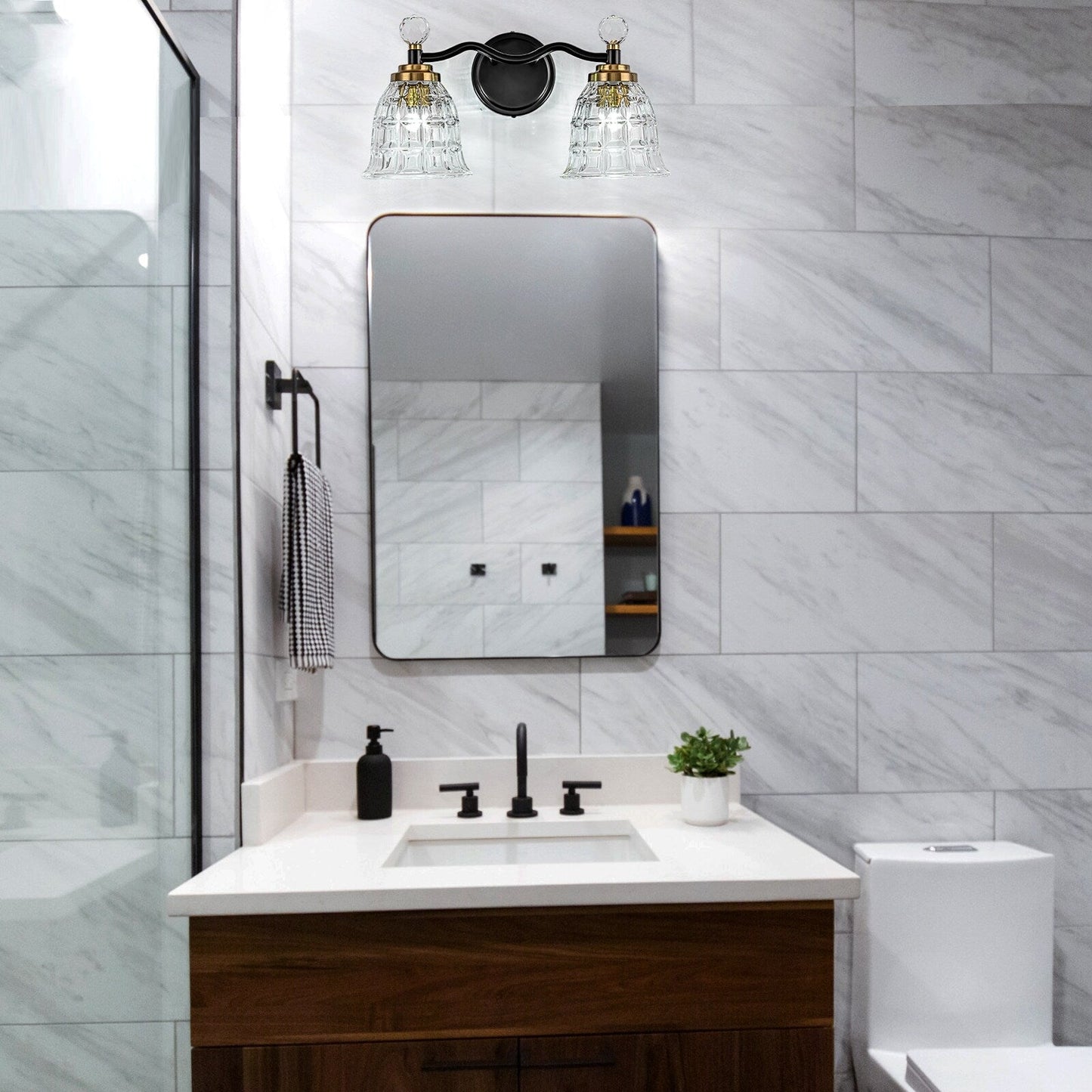 Luminaires de salle de bain modernes Ora à intensité variable, noirs et dorés